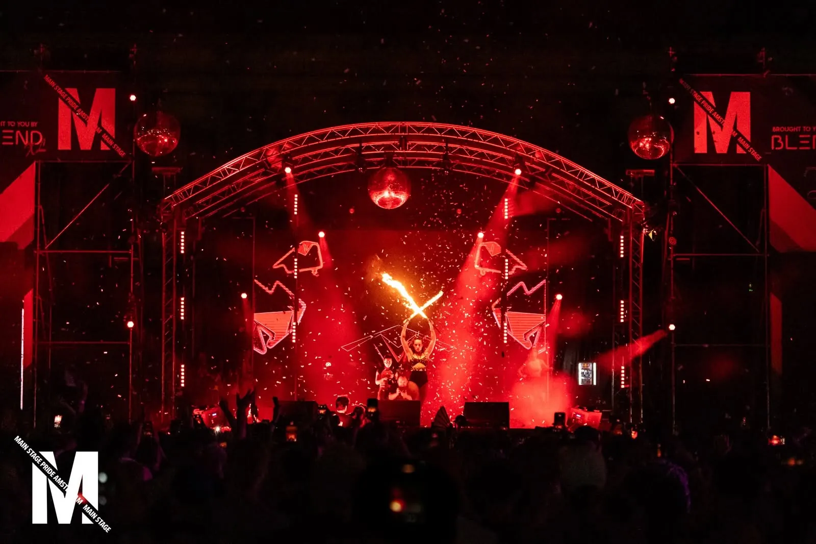 Mainstage bathed in red light at night, MainStage Pride Amsterdam 2026